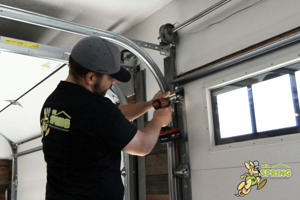 Technician doing a garage repair