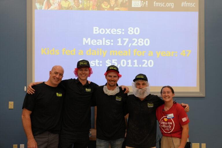 A team picture of Mr. Spring Garage Doors with FMSC staff